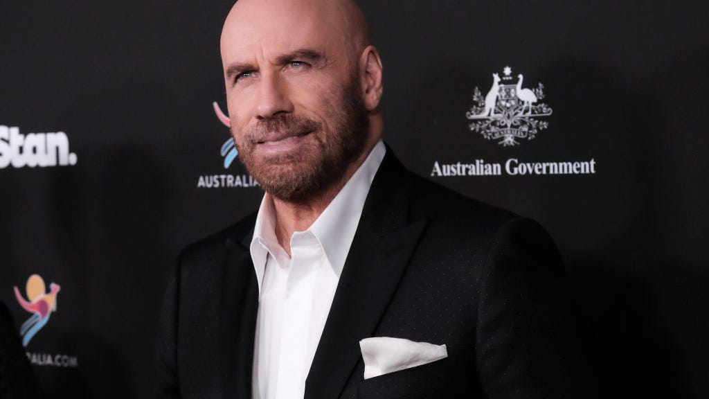 John Travolta honors Betty White's animal activism by adopting dog from her Oscars tribute