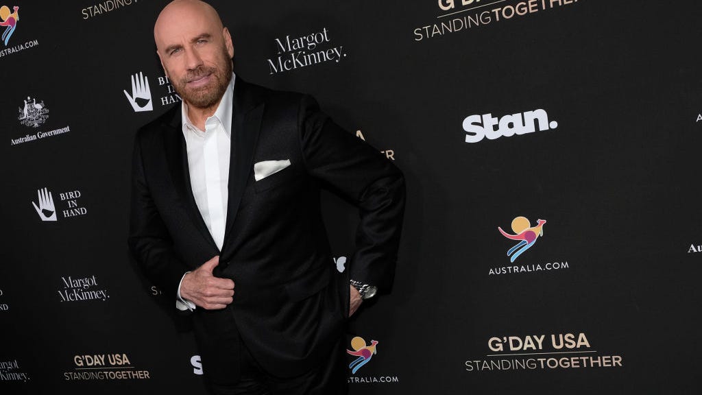John Travolta shares the ‘very proud’ moment he got his license to pilot a 737