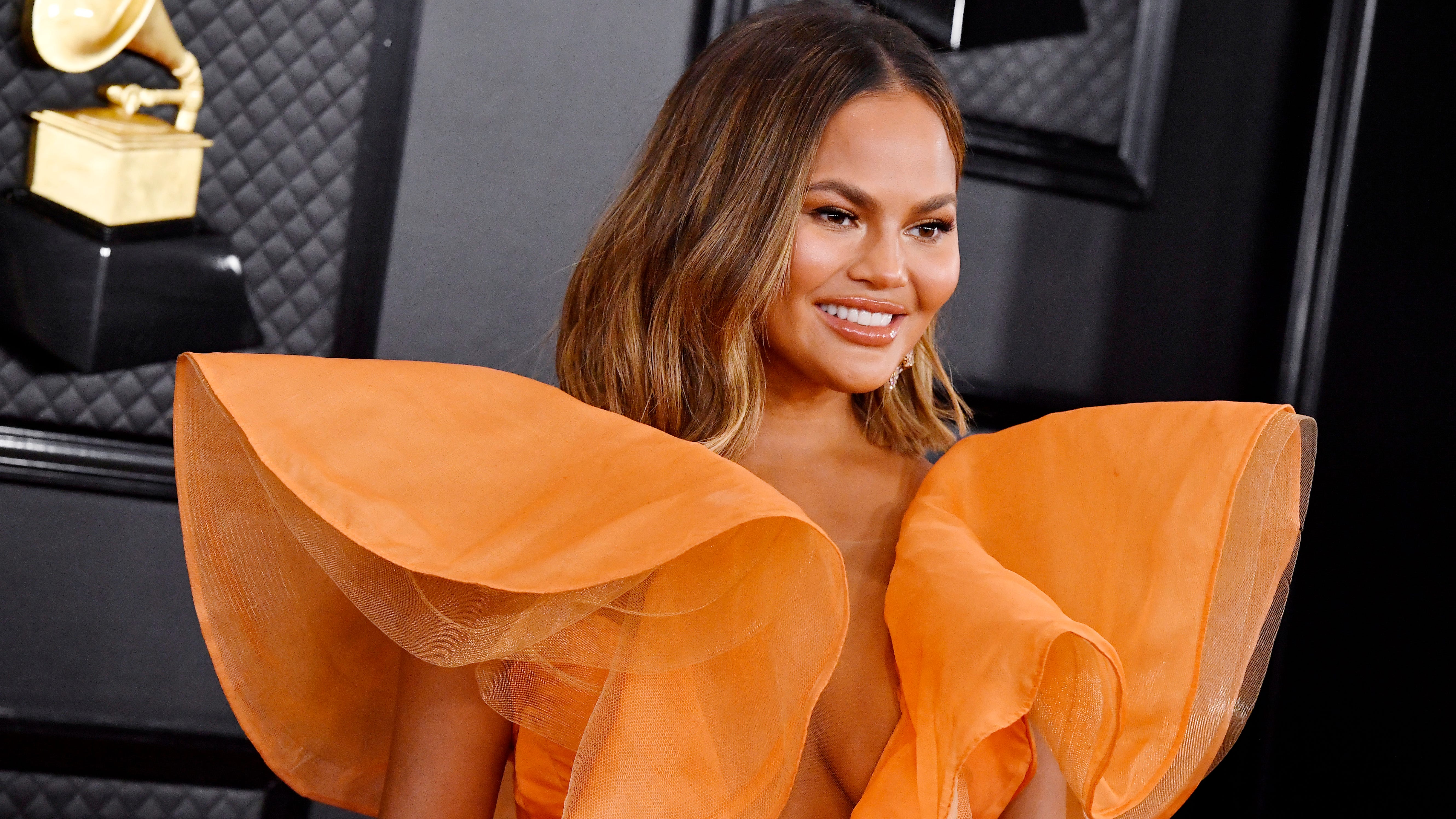 Chrissy Teigen debuts flashy new hair color