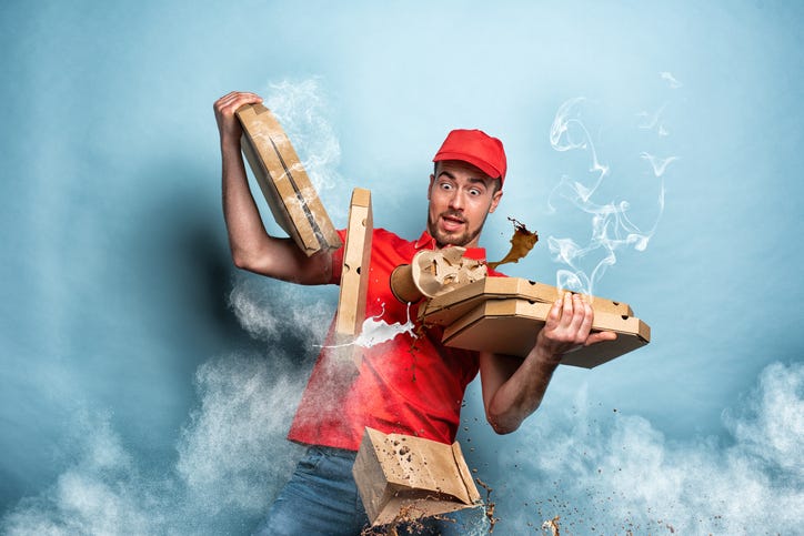 Overwhelmed delivery man