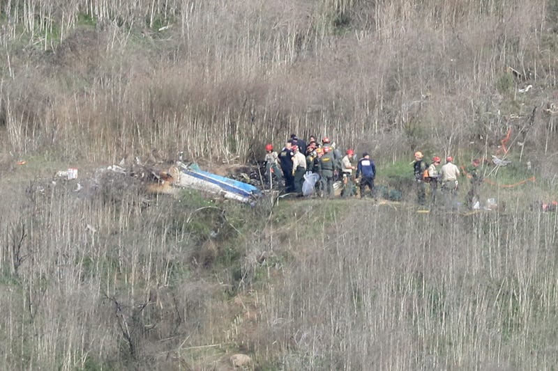 Emergency personnel work at the helicopter crash site that claimed the life of former NBA great Kobe Bryant on January 27, 2020 in Calabasas, California.
