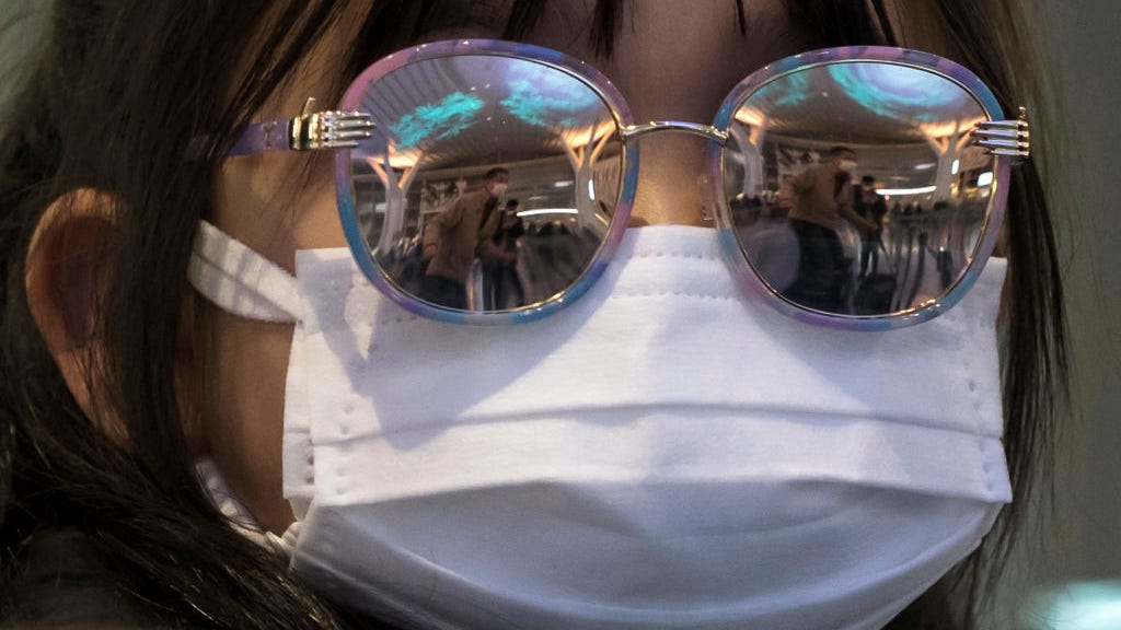 Masks will be required indoors in California for a little longer. Who needs them the most?