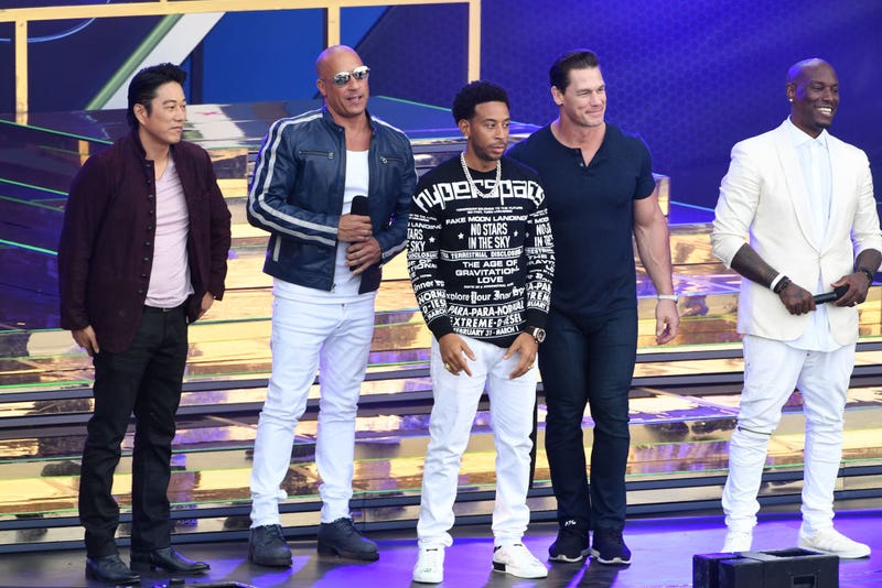 (L-R) Sung Kang, Vin Diesel, Ludacris, John Cena and Tyrese Gibson speak onstage during Universal Pictures Presents The Road To F9 Concert and Trailer Drop on January 31, 2020 in Miami, Florida.