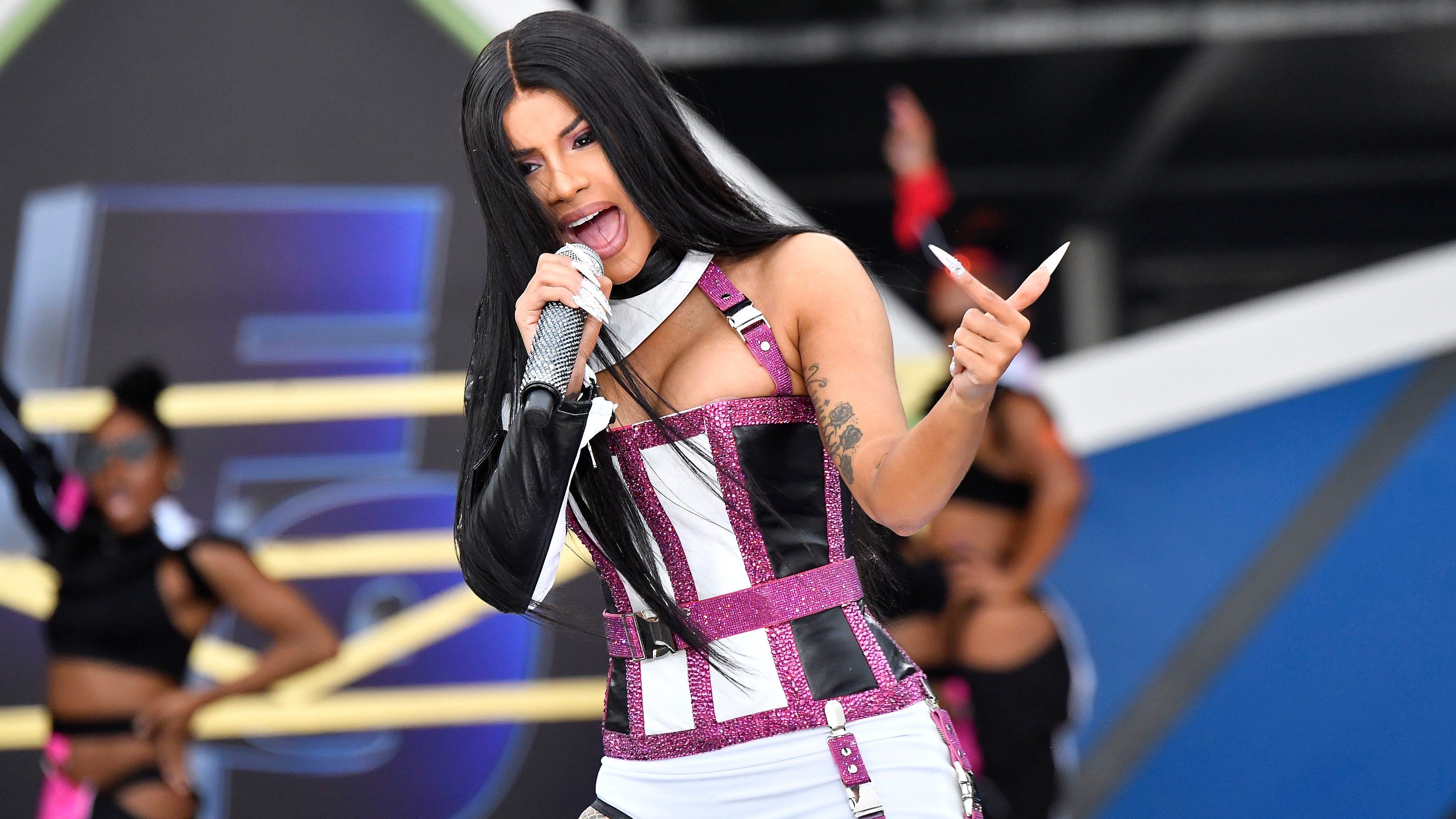 Mic Cardi B threw at fan sells for nearly $100,000 at auction