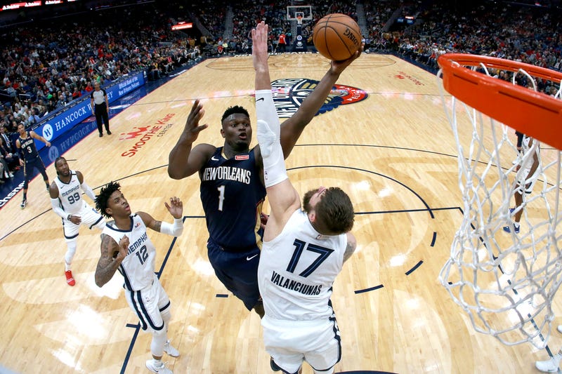 Zion Williamson skies to the rim against the Grizzlies.
