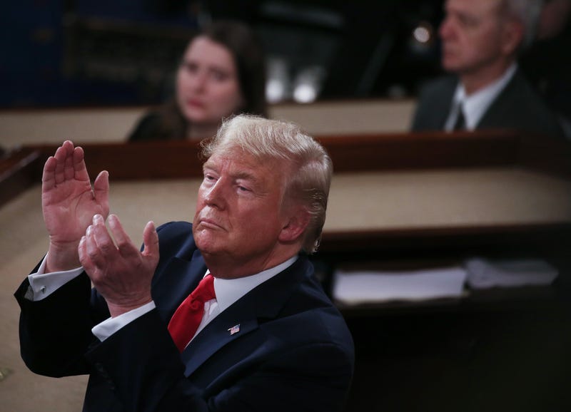 WASHINGTON, DC - FEBRUARY 04: President Donald Trump applauds as he delivers the State of the Union address in the chamber of the U.S. House of Representatives on February 04, 2020 in Washington, DC. President Trump delivers his third State of the Union to the nation the night before the U.S. Senate is set to vote in his impeachment trial. (Photo by Mario Tama/Getty Images)
