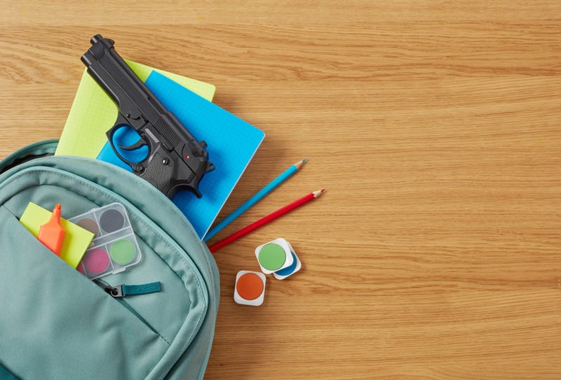 gun in backpack