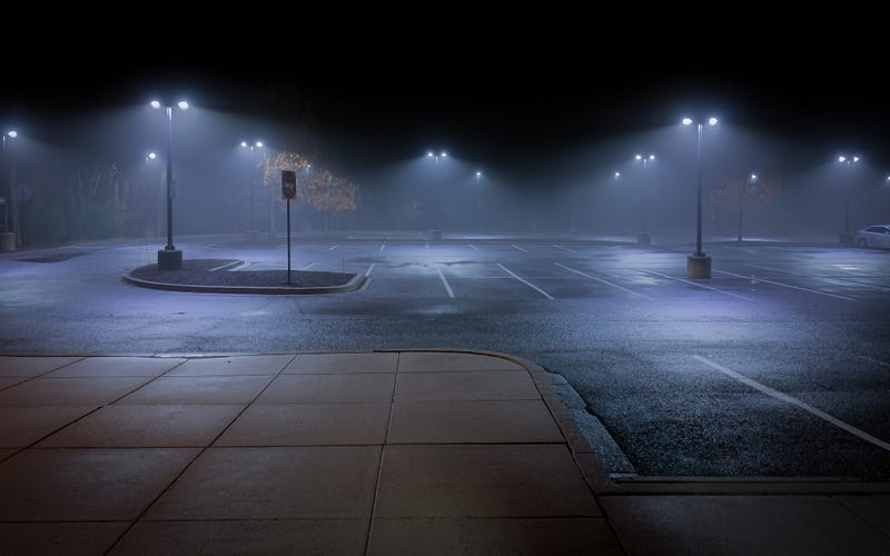 Empty parking lot at night