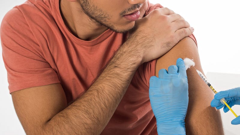 A man getting a vaccine.