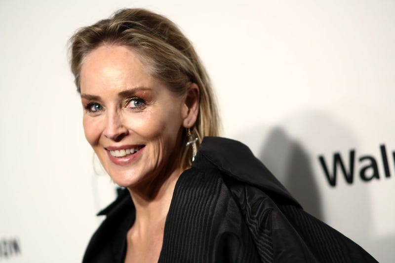 Sharon Stone walks the red carpet at the Elton John AIDS Foundation Academy Awards Viewing Party