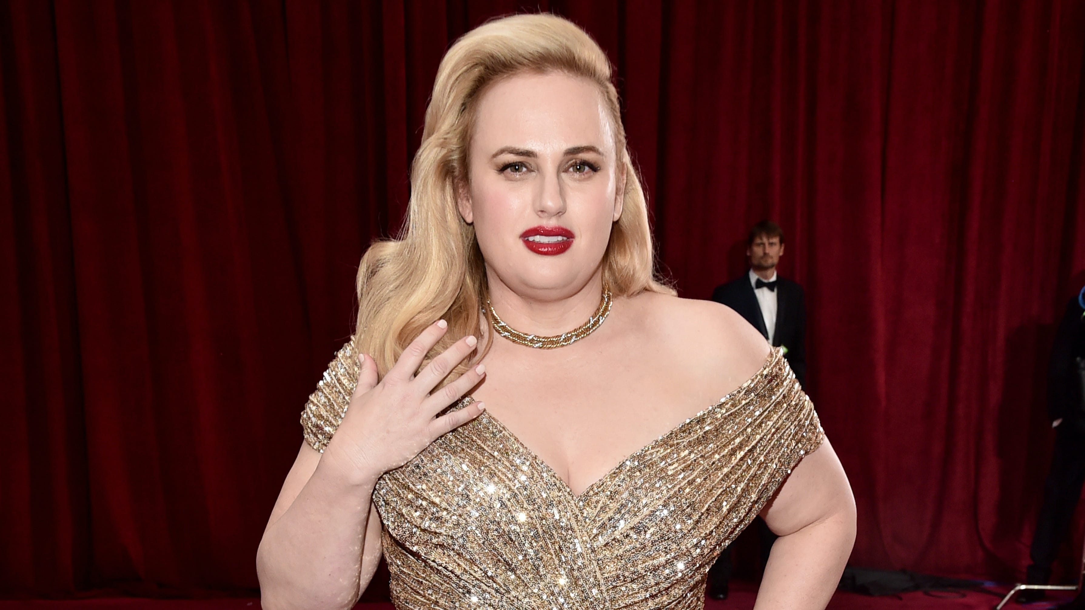 Rebel Wilson, 41, flaunts bombshell figure in hot pink '80s bodysuit