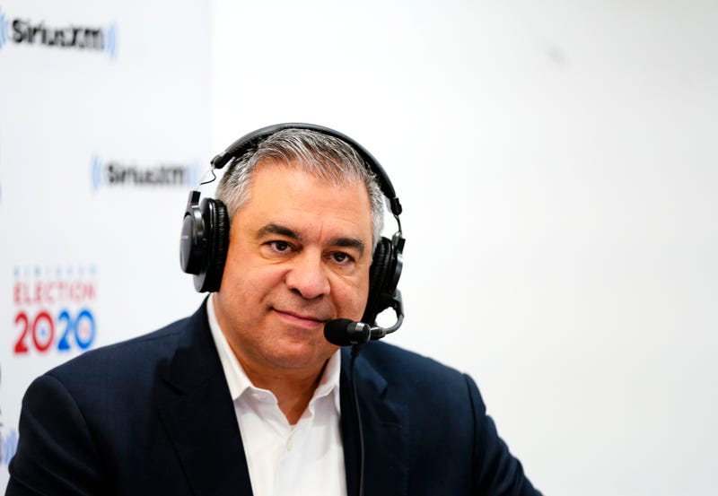 Senior adviser to Trump 2020, David Bossie looks on while talking with Sirius XM P.O.T.U.S Tim Farley and Corey Lewandowski in the Coolidge Room at the DoubleTree by Hilton on February 11, 2020 in Manchester, New Hampshire. 