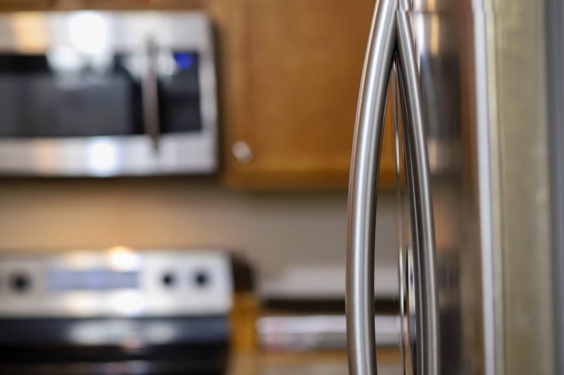 Refrigerator with French doors stock photo.