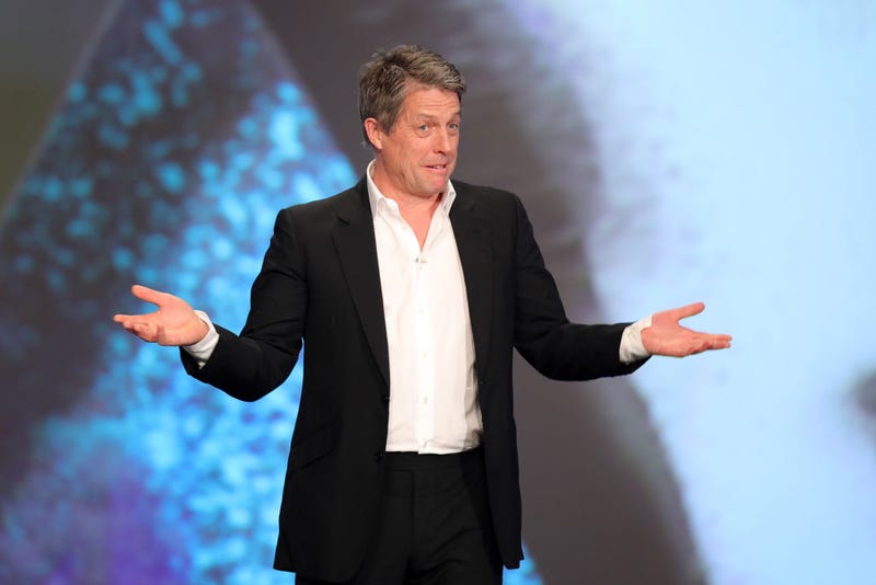Host Hugh Grant speaks on stage during the 2020 Laureus World Sports Awards at Verti Music Hall on February 17, 2020 in Berlin, Germany
