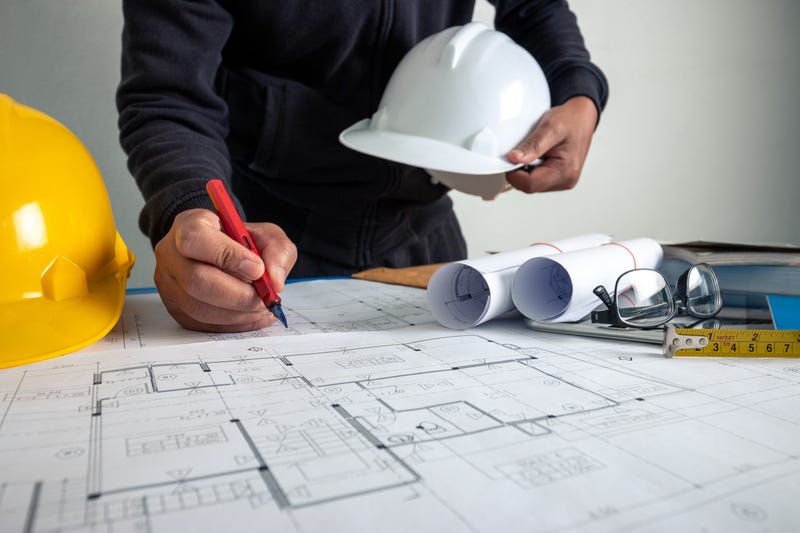 architect is working to design the building 