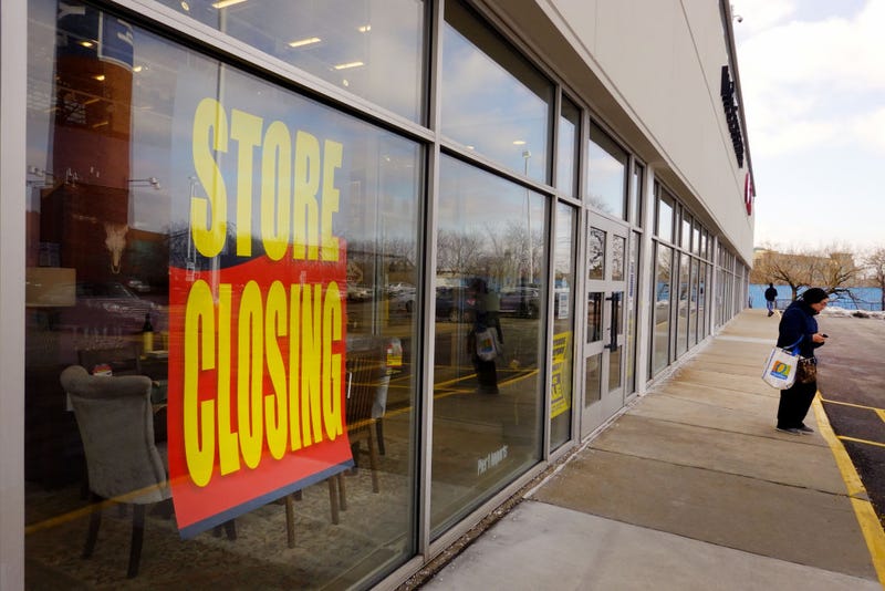Store closing signs hang in a window February 18, 2020 in Chicago, Illinois.