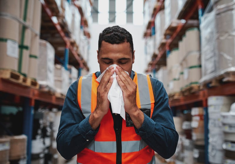 Sick warehouse worker