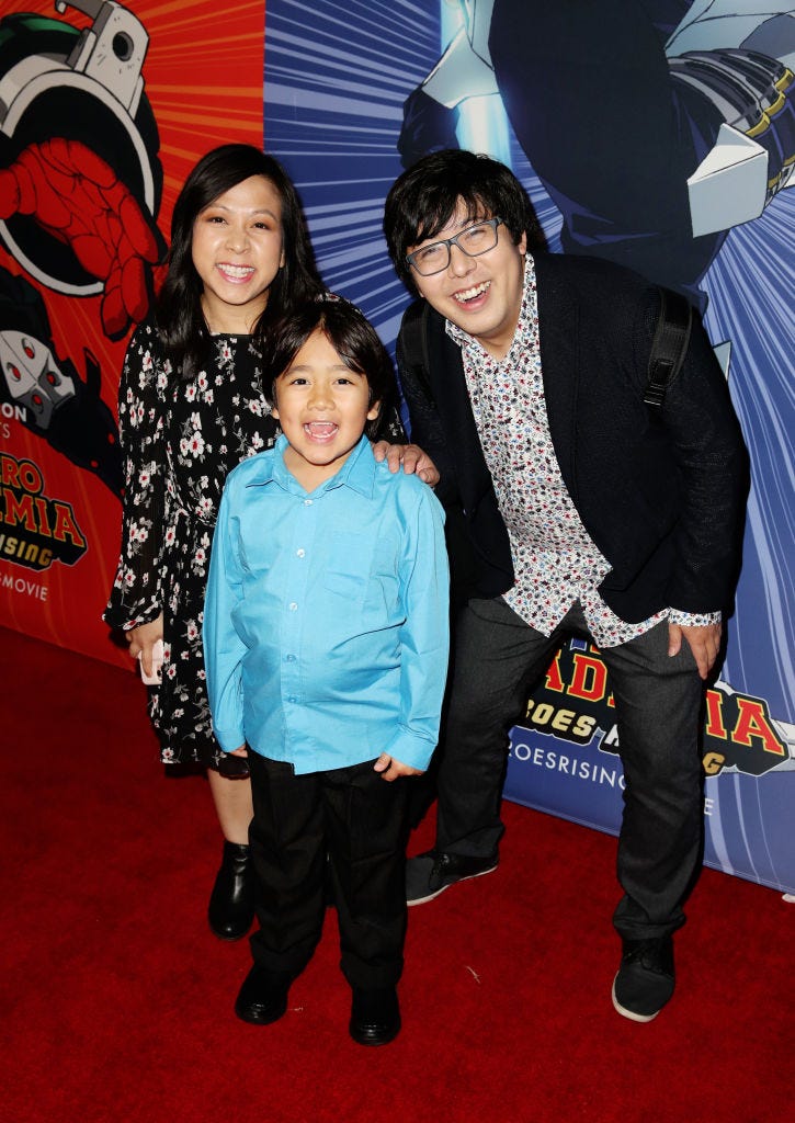 Ryan Kaji (center) with mother Loann Kaji (left) and Shion Kaji (right)