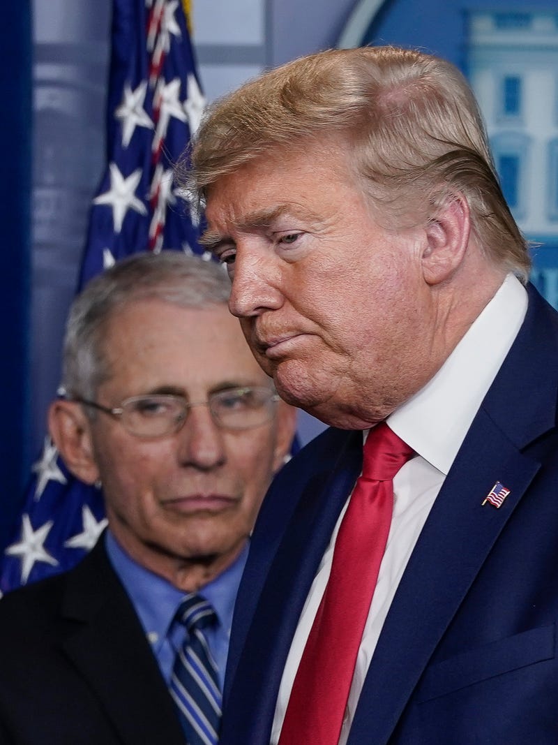 Dr. Anthony Fauci, director of the National Institute of Allergy and Infectious Diseases, and U.S. President Donald Trump depart a briefing on the coronavirus pandemic, in the press briefing room of the White House on March 24, 2020 in Washington, DC. Cases of COVID-19 continue to rise in the United States, with New Yorks case count doubling every three days according to governor Andrew Cuomo.