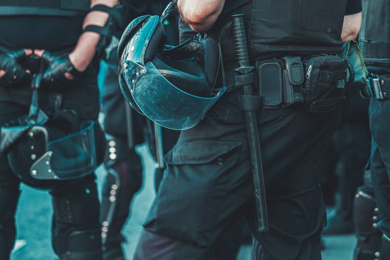 Police officers in full combat uniform