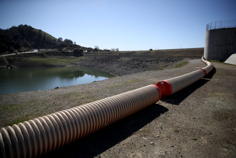 A buoy sits on the ground next to the dam at Anderson Reservoir on February 25, 2020 in Morgan Hill, California.