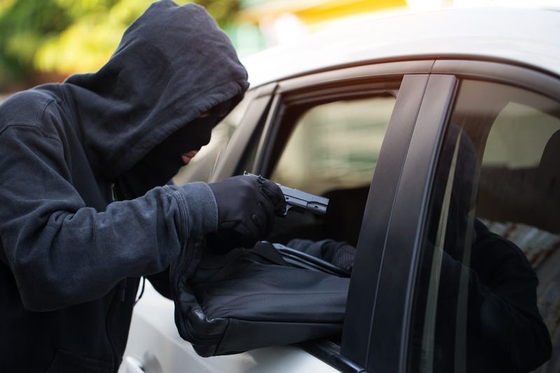 Driver held up by two hooded men