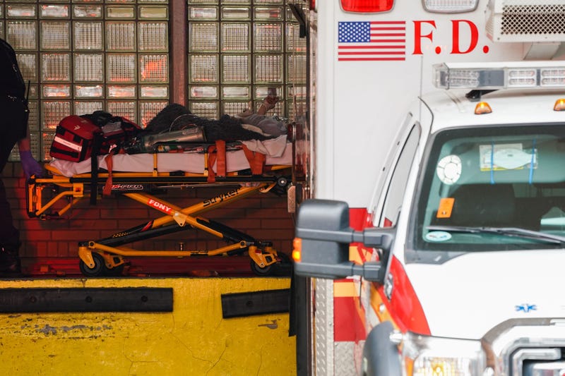 An FDNY ambulance delivers a person in need of medical attention to Wyckoff Hospital in the Bushwick section of Brooklyn on April 5, 2020, in New York.