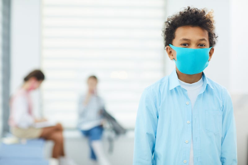 boy wearing face mask