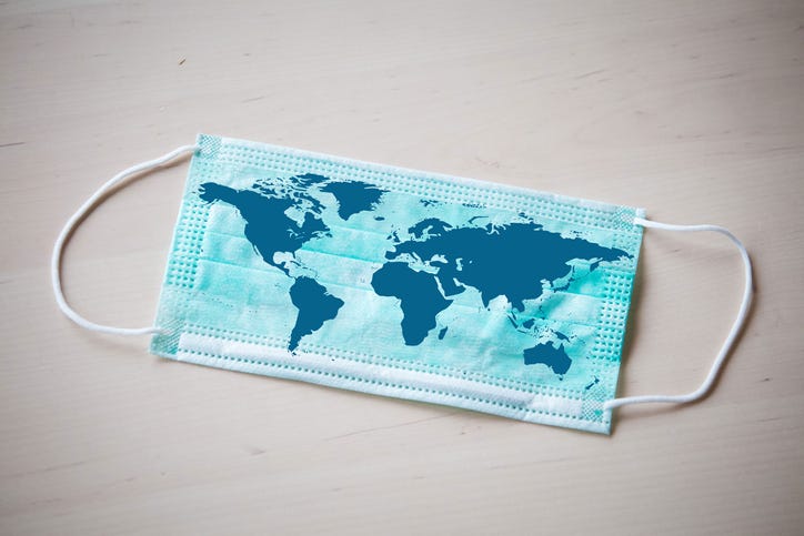 World map on a face mask. 
