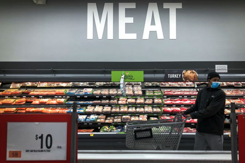 A man shops in the meat section at a grocery store, April 28, 2020 Washington, DC. 