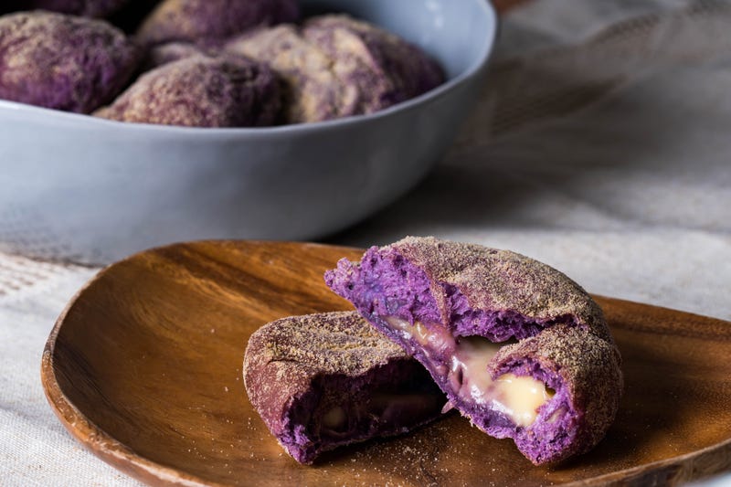 Ube cheese pandesal: a gourmet pandesal that has a filling of ube and cheese combination.