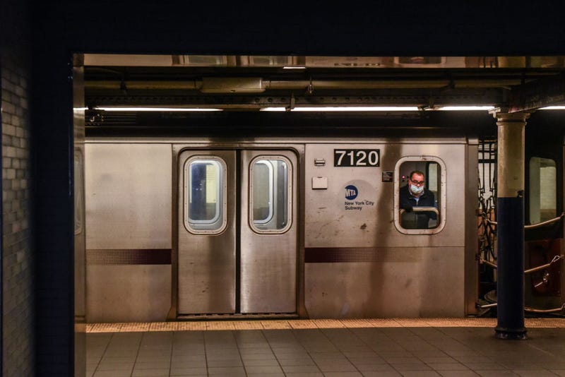A train conductor wears a protective mask while riding on a subway through the Fulton St. station on May 6, 2020 in Manhattan in New York City.
