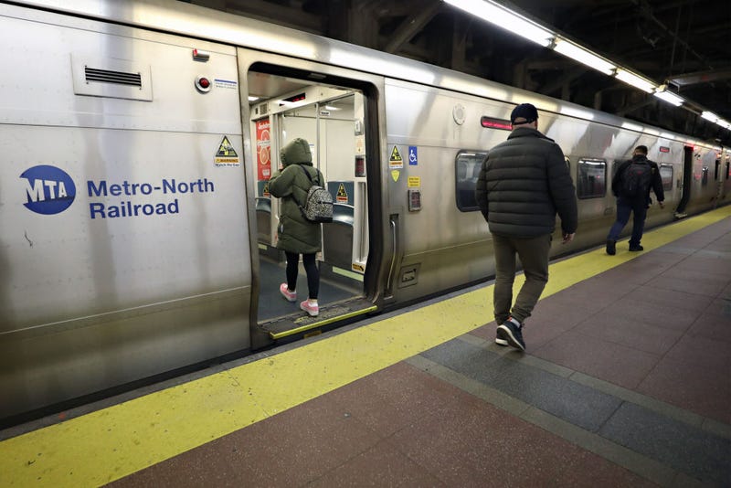 A view of commuters entering a Metro North train at Grand Central Terminal during rush hour on March 12, 2020 in New York City. As the coronavirus (COVID-19) continues to spread in the United States, many professional events have been canceled and some businesses are starting to have their employees work from home.