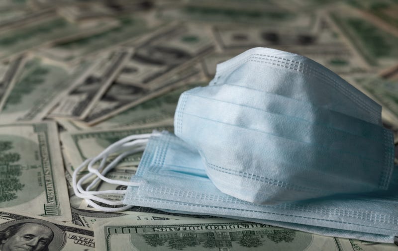 Face masks on top of money