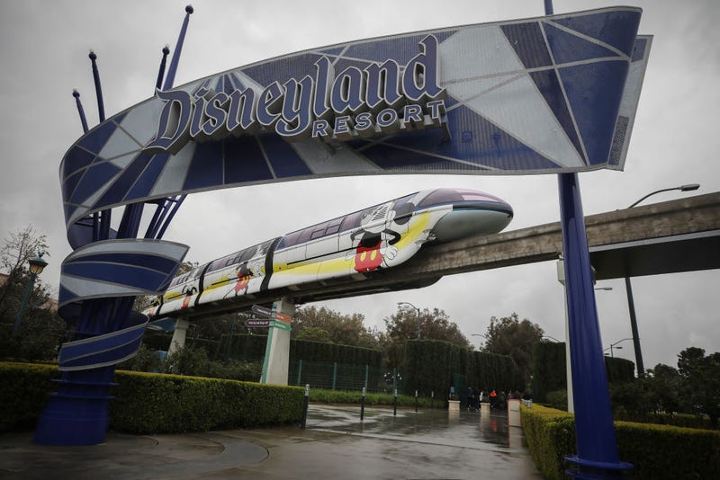 The monorail passes an entrance gate to the famed amusement park Disneyland on March 13, 2020 in Anaheim, California.