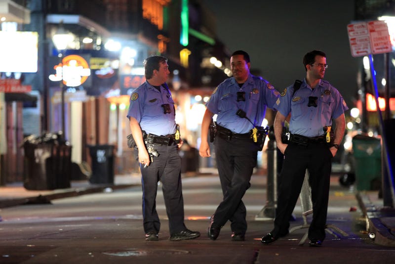 Members of the New Orleans Police Department stand on Bourbon Street as Louisiana Governor John Bel Edwards orders bars, gyms and casinos to close until April 13th due to the spread of coronavirus (COVID-19) on March 16, 2020 in New Orleans, Louisiana. The World Health Organization declared COVID-19 a global pandemic on March 11. (Photo by Chris Graythen/Getty Images)