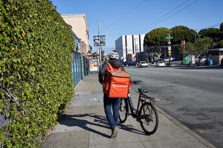 DoorDash worker with a bicycle