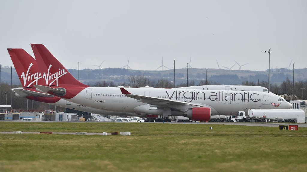 Flight diverted after man tries to punch, bite fellow passengers
