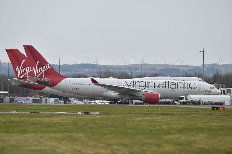 Virgin Atlantic planes sit on the runway at Glasgow Airport on March 21, 2020 in Glasgow, Scotland. 