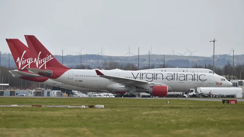 Flight diverted after man tries to punch, bite fellow passengers