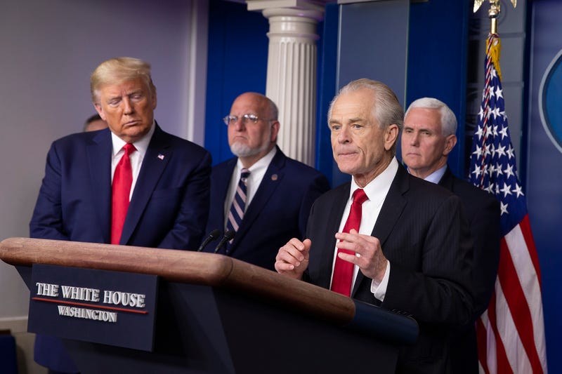 President Donald Trump, Dr. Robert Redfield, Director of the Center for Disease Control and Prevention and Vice President Mike Pence listen to Peter Navarro, Director of the National Trade Council speak during a press briefing in the James Brady Press Briefing Room at the White House on March 22, 2020 in Washington, DC.