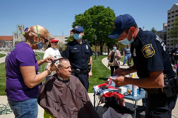 judge dismisses charges for women cutting hair at Michigan Capitol
