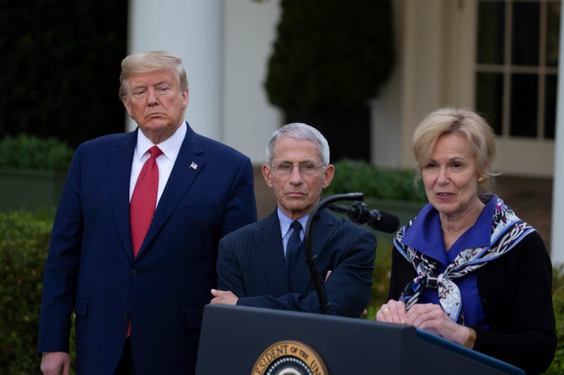 U.S. President Donald Trump and Anthony Fauci, Director of the National Institute of Allergy and Infectious Diseases, listen to White House coronavirus response coordinator Deborah Birx speak in the Rose Garden for the daily coronavirus briefing at the White House on March 29, 2020 in Washington, DC. The United States is advising residents of New York, New Jersey and Connecticut not to travel domestically after the number of reported coronavirus deaths doubled to over 2,000 nationwide within two days.