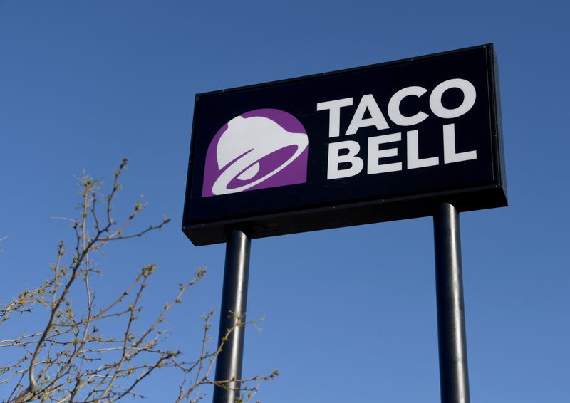 LAS VEGAS, NEVADA - MARCH 30: An exterior view shows a sign at a Taco Bell restaurant on March 30, 2020 in Las Vegas, Nevada. Taco Bell Corp. announced that on March 31, 2020, the company will give everyone in the country one free beef nacho cheese Doritos Locos Taco, no purchase necessary, to drive-thru customers at participating locations while supplies last as a way of thanking people who are helping their communities in the wake of the coronavirus pandemic. The company also announced it would relaunch its Round Up program, which gives customers the option to "round up" their order total to the nearest dollar, to raise funds for the No Kid Hungry campaign. The Taco Bell Foundation will also be donating $1 million dollars to the campaign.