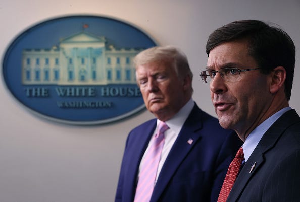 Secretary of Defense Mark Esper speaks as U.S. President Donald Trump listens during the daily White House coronavirus press briefing April 1, 2020 in Washington, DC.