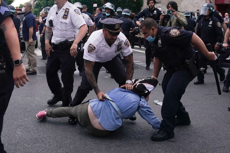 NYPD officers arrest protesters during a demonstration on May 30, 2020, against the killing of George Floyd by Minneapolis police