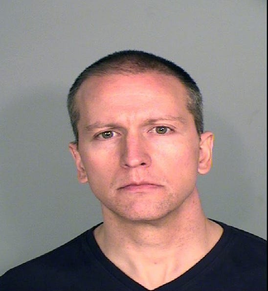  In this handout provided by Ramsey County Sheriff's Office, former Minneapolis police officer Derek Chauvin poses for a mugshot after being charged in the death of George Floyd .