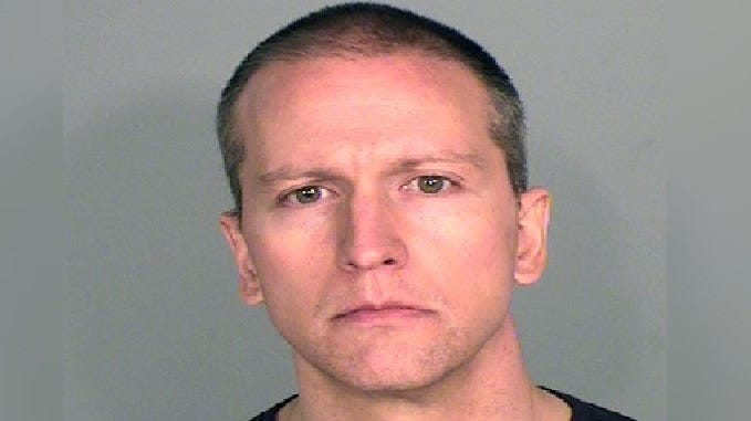 In this handout provided by Ramsey County Sheriff's Office, former Minneapolis police officer Derek Chauvin poses for a mugshot after being charged in the death of George Floyd .