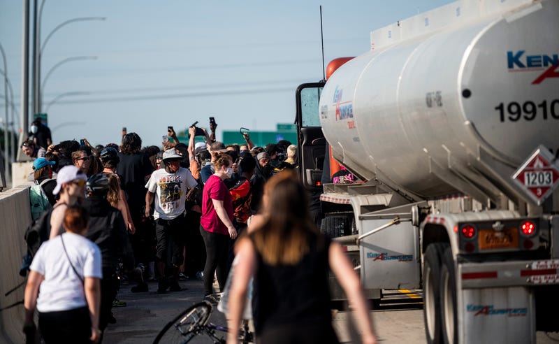 Charges to be dropped against truck driver who drove into protesters