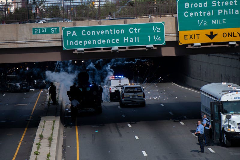 Police shoot tear gas into a crowd of protesters after a march through Center City on June 1, 2020 in Philadelphia